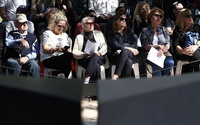Family and friends seen at a memorial service marking 21 years since former prime minister Yitzhak Rabin's assassination, held at Mount Herzl cemetery in Jerusalem, November 4, 2015. (Yonatan Sindel/Flash90) Family and friends seen at a memorial service marking 21 years since former prime minister Yitzhak Rabin's assassination, held at Mount Herzl cemetery in Jerusalem, November 4, 2015. (Yonatan Sindel/Flash90)