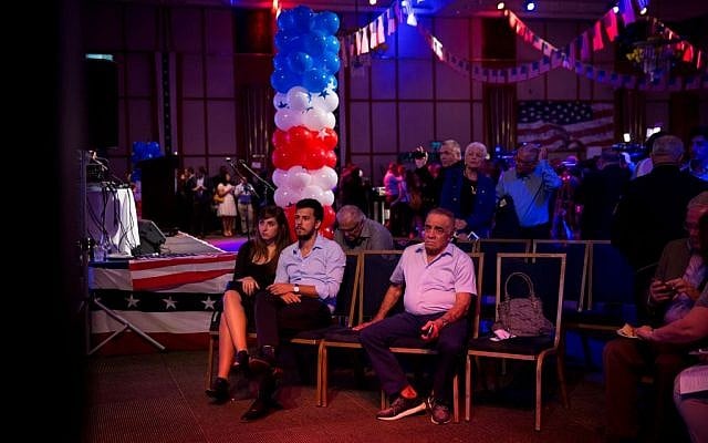 People watch elections results at a US presidential elections event organized by the US Embassy in Tel Aviv, on November 8, 2016. (Miriam Alster/Flash90) People watch elections results at a US presidential elections event organized by the US Embassy in Tel Aviv, on November 8, 2016. (Miriam Alster/Flash90)