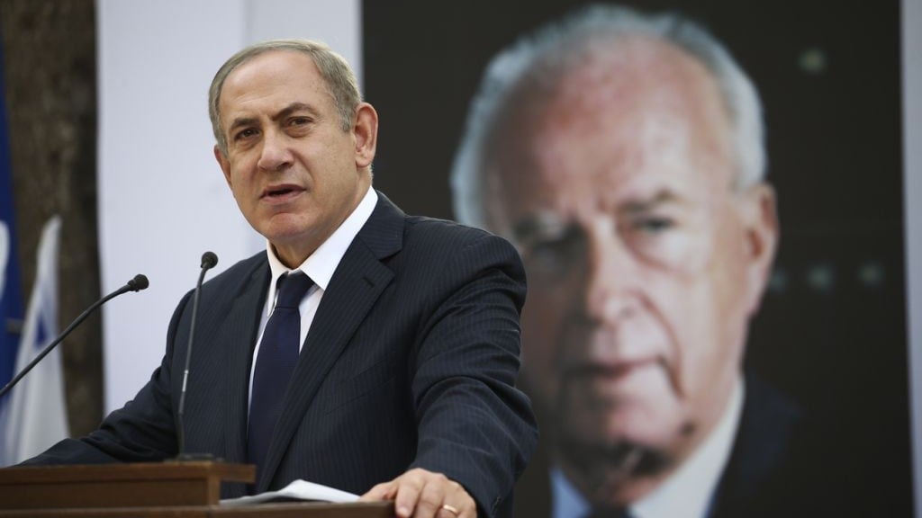 Prime Minister Benjamin Netanyahu speaks at a memorial service marking 21 years since the assassination of prime minister Yitzhak Rabin, at Mount Herzl cemetery in Jerusalem on November 13, 2016. (Ohad Zwigenberg/POOL) Prime Minister Benjamin Netanyahu speaks at a memorial service marking 21 years since the assassination of prime minister Yitzhak Rabin, at Mount Herzl cemetery in Jerusalem on November 13, 2016. (Ohad Zwigenberg/POOL)