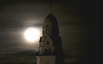 The supermoon rises over the Dormition Abbey in Jerusalem's Old City on November 14, 2016. (Yonatan Sindel/Flash90