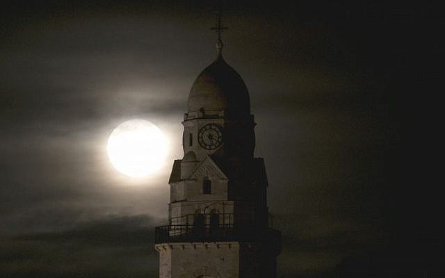 The supermoon rises over the Dormition Abbey in Jerusalem's Old City on November 14, 2016. (Yonatan Sindel/Flash90 The supermoon rises over the Dormition Abbey in Jerusalem's Old City on November 14, 2016. (Yonatan Sindel/Flash90