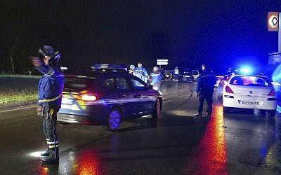 French Gendarmes patrol cars near the village of Montferrier-sur-Lez, southern France, Friday, Nov. 25, 2016. (AP Photo)