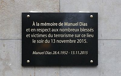 A commemorative plaque unveiled by French President Francois Hollande and Saint-Denis Mayor Didier Paillard is seen outside the Stade de France stadium, in Saint-Denis, near Paris, France, Sunday, November 13 2016. The plaque reads : In memory of Manuel Dias and in respect of the numerous wounded and victims of the terrorism. (Philippe Wojazer/Pool Photo via AP)