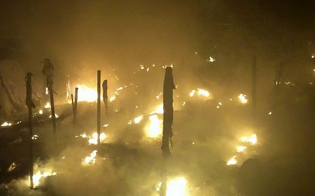 Tents burn at the Moria refugee camp on the northeastern Greek island of Lesbos, early Friday, Nov. 25, 2016. (AP Photo)