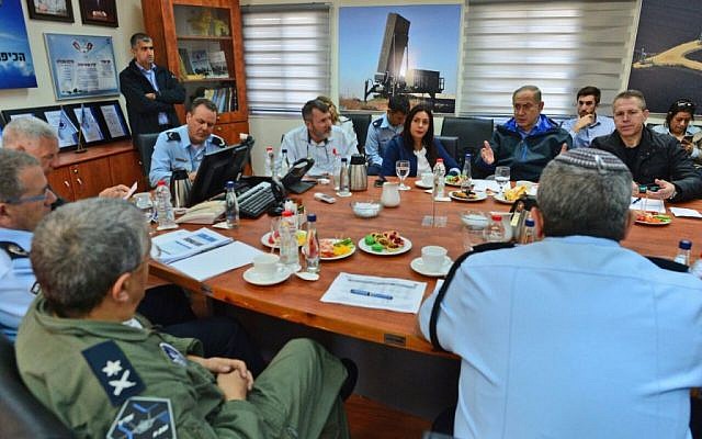 Prime Minister Benjamin Netanyahu (3R) meets with security officials at the Hatsor Air force base where firefighting planes are based on Friday November 25, 2106 (Kobi Gideon / gpo) Prime Minister Benjamin Netanyahu (3R) meets with security officials at the Hatsor Air force base where firefighting planes are based on Friday November 25, 2106 (Kobi Gideon / gpo)