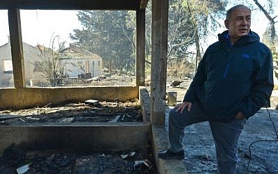 Prime Minister Benjamin Netanyahu tours the village of Beit Meir in the Jerusalem hills, which was ravaged by a wildfire overnight on Friday, November 25, 2016 (Kobi Gideon / GPO) Prime Minister Benjamin Netanyahu tours the village of Beit Meir in the Jerusalem hills, which was ravaged by a wildfire overnight on Friday, November 25, 2016 (Kobi Gideon / GPO)