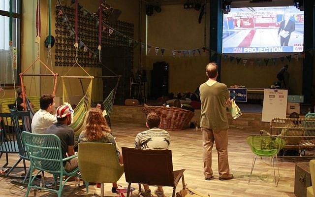 Supporters of Democrat candidate Hillary Clinton watch the results of the 2016 US election in Tel Aviv's Abraham Hostel on November 9, 2016. (Judah Ari Gross/Times of Israel) Supporters of Democrat candidate Hillary Clinton watch the results of the 2016 US election in Tel Aviv's Abraham Hostel on November 9, 2016. (Judah Ari Gross/Times of Israel)