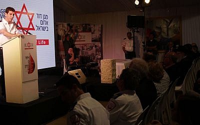 MDA Director Eli Bin speaks at a cornerstone-laying ceremony for the emergency service's new blood bank in Ramle on November 16, 2016. (Judah Ari Gross/Times of Israel)
