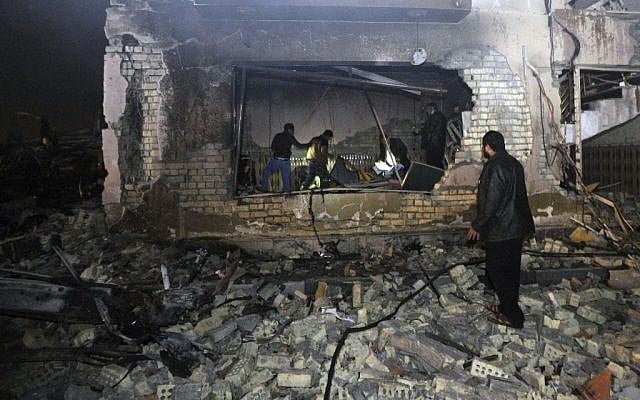 Civilians search for survivors in the rubble at the scene of a car bomb attack near the city of Hilla about 95 kilometers (60 miles) south of Baghdad, Iraq, Thursday, Nov. 24, 2016. (AP/Hadi Mizban) Civilians search for survivors in the rubble at the scene of a car bomb attack near the city of Hilla about 95 kilometers (60 miles) south of Baghdad, Iraq, Thursday, Nov. 24, 2016. (AP/Hadi Mizban)