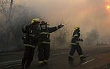 Illustrative photo of firefighters, Thursday, Nov. 24, 2016. (AP Photo/Ariel Schalit)