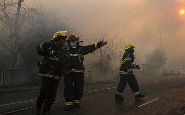 Illustrative photo of firefighters, Thursday, Nov. 24, 2016. (AP Photo/Ariel Schalit)