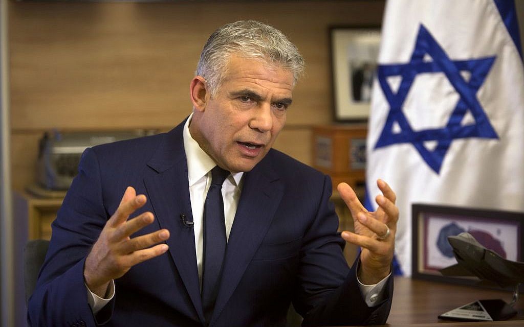 Monday, Oct. 31, 2016 photo, Israeli Knesset member, Yair Lapid, leader of the Yesh Atid party, spoke during an interview with The Associated Press, in his office at the Knesset, Israel's parliament, in Jerusalem. (AP Photo/Sebastian Scheiner)