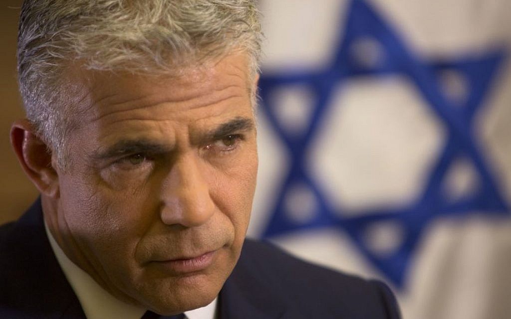 Yair Lapid, leader of the Yesh Atid party, in his office at the Knesset (AP Photo/Sebastian Scheiner)