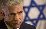 Yair Lapid, leader of the Yesh Atid party, in his office at the Knesset (AP Photo/Sebastian Scheiner)