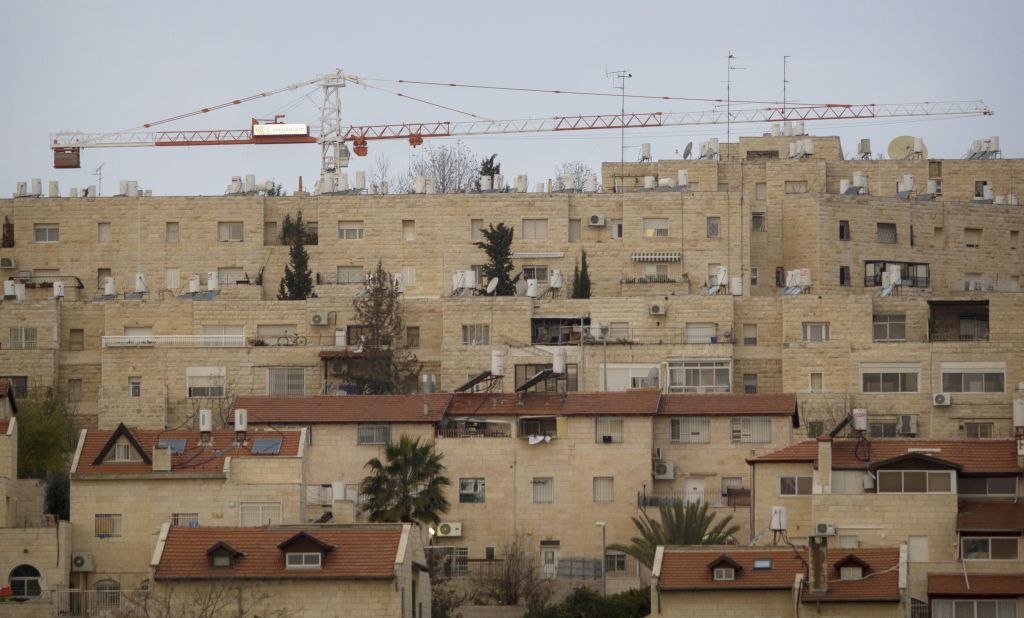 Construction cranes in the Jewish neighborhood of Gilo in East Jerusalem, January 16, 2011. (AP Photo/Sebastian Scheiner, file) Construction cranes in the Jewish neighborhood of Gilo in East Jerusalem, January 16, 2011. (AP Photo/Sebastian Scheiner, file)