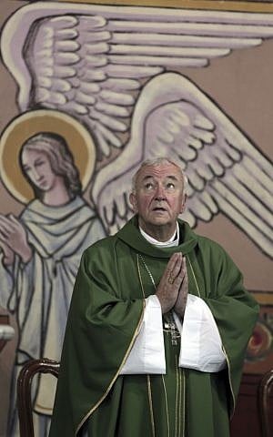 Cardinal Vincent Nichols, Archbishop of Westminster, holds a Sunday mass at the Holy Family Catholic Church in Gaza City, November 6, 2016. (AP Photo/ Khalil Hamra)