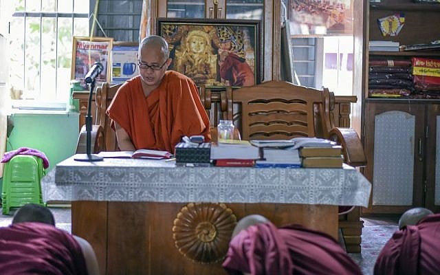 In this Nov. 12, 2016 photo, Wirathu, a high-profile leader of the Myanmar Buddhist organization known as Ma Ba Tha, teaches some younger novice monks at his monastery in Mandalay, Myanmar. (AP/Aung Naing Soe) In this Nov. 12, 2016 photo, Wirathu, a high-profile leader of the Myanmar Buddhist organization known as Ma Ba Tha, teaches some younger novice monks at his monastery in Mandalay, Myanmar. (AP/Aung Naing Soe)