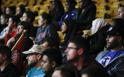 Students attend a vigil following an attack at the Ohio State University campus the previous day, Tuesday, Nov. 29, 2016, in Columbus, Ohio. (AP Photo/John Minchillo)