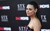 In this July 26, 2016 file photo, Mila Kunis, a cast member in "Bad Moms," poses at the premiere of the film at the Mann Village Theatre in Los Angeles. (Chris Pizzello/Invision/AP, File)