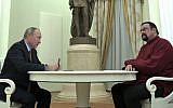 Russian President Vladimir Putin, left, hosts US actor Steven Seagal in the Kremlin in Moscow, Friday, Nov. 25, 2016. (Alexei Druzhinin/Sputnik, Kremlin Pool Photo via AP)
