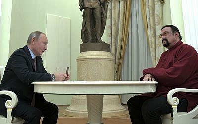 Russian President Vladimir Putin, left, hosts US actor Steven Seagal in the Kremlin in Moscow, Friday, Nov. 25, 2016. (Alexei Druzhinin/Sputnik, Kremlin Pool Photo via AP)