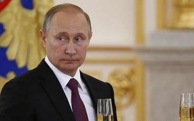 Russian President Vladimir Putin makes a toast during a ceremony for receiving diplomatic credentials from foreign ambassadors in the Kremlin, Moscow, Russia, November 9, 2016. (Sergei Karpukhin/via AP) Russian President Vladimir Putin makes a toast during a ceremony for receiving diplomatic credentials from foreign ambassadors in the Kremlin, Moscow, Russia, November 9, 2016. (Sergei Karpukhin/via AP)