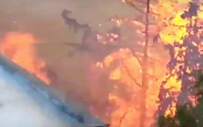 Image of the fire that raged outside the apartment building of Haifa residents Gilad Mulyan and Joseph Goren on November 24th, 2016. The building was saved from the flames with the help of Palestinian construction workers. (Courtesy) Image of the fire that raged outside the apartment building of Haifa residents Gilad Mulyan and Joseph Goren on November 24th, 2016. The building was saved from the flames with the help of Palestinian construction workers. (Courtesy)
