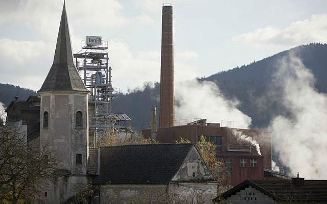 Smoke and steam rise from a factory in Sevnica, Slovenia, Wednesday, Nov. 9, 2016. (AP Photo/Darko Bandic)