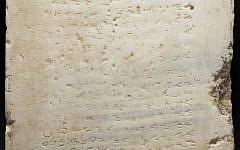 This undated photo provided by Heritage Auctions, HA.com shows the world's earliest-known stone inscription of the Ten Commandments – a two-foot square slab of white marble, weighing about 115 pounds and inscribed in an early Hebrew script called Samaritan, that sold for $850,000 Wednesday evening, Nov. 16, 2016, (Matt Roppolo/Heritage Auctions, HA.com via AP)