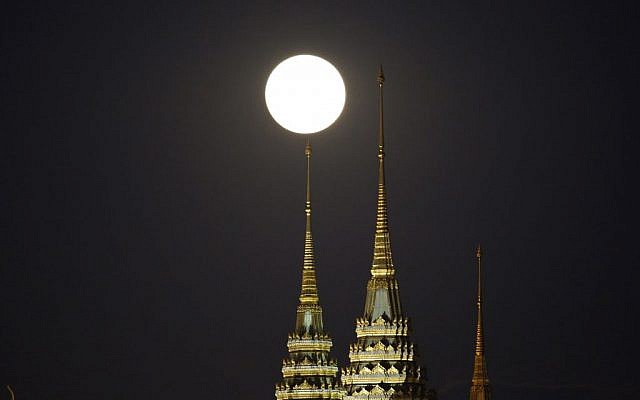 The brightest moon in almost 69 years rises over the Grand Palace in Bangkok, Thailand Monday, Nov. 14, 2016. (Sakchai Lalit/AP Photo) The brightest moon in almost 69 years rises over the Grand Palace in Bangkok, Thailand Monday, Nov. 14, 2016. (Sakchai Lalit/AP Photo)