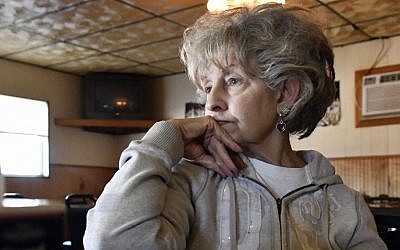 Judy Pennington, a resident of Elliott County listens to a question, n Sandy Hook Ky, Nov. 10, 2016. (AP/Timothy D. Easley)