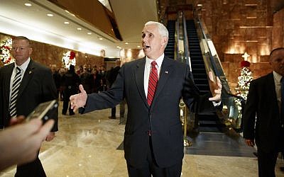 Vice President-elect Mike Pence talks with reporters as he leaves Trump Tower, in New York, November 28, 2016. (AP/Evan Vucci) Vice President-elect Mike Pence talks with reporters as he leaves Trump Tower, in New York, November 28, 2016. (AP/Evan Vucci)