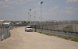 Photo of a fence along US-Mexico border. (Wikimedia Commons)