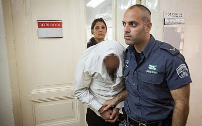 An ultra-Orthodox man is brought to court after being arrested on charges of drugging and raping his daughter, November 2, 2016. (Hadas Parush/Flash90)
