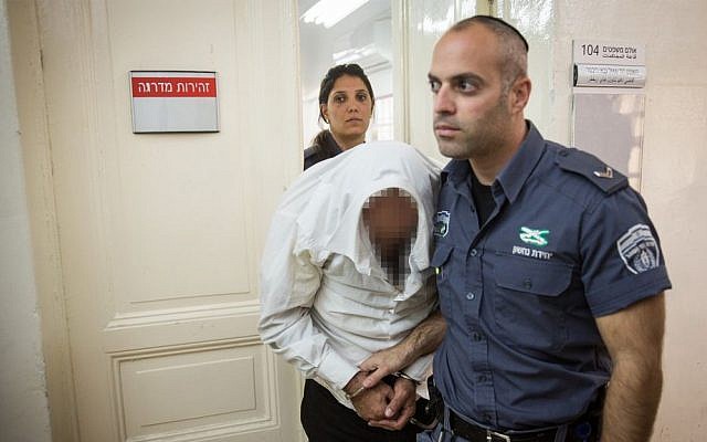 An ultra-Orthodox man is brought to court after being arrested on charges of drugging and raping his daughter, November 2, 2016. (Hadas Parush/Flash90) An ultra-Orthodox man is brought to court after being arrested on charges of drugging and raping his daughter, November 2, 2016. (Hadas Parush/Flash90)