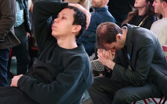 People watch the election results in Times Square in New York City, USA. November 8, 2016. (Noam Revkin Fenton/Flash90)