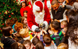 Handing out chocolates at the YMCA tree trimming in November 2015 (Courtesy YMCA)