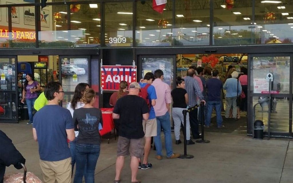 Voters line up outside the Fiesta supermarket in Austin, Texas, November 8, 2016. (Ricky Ben-David/Times of Israel)