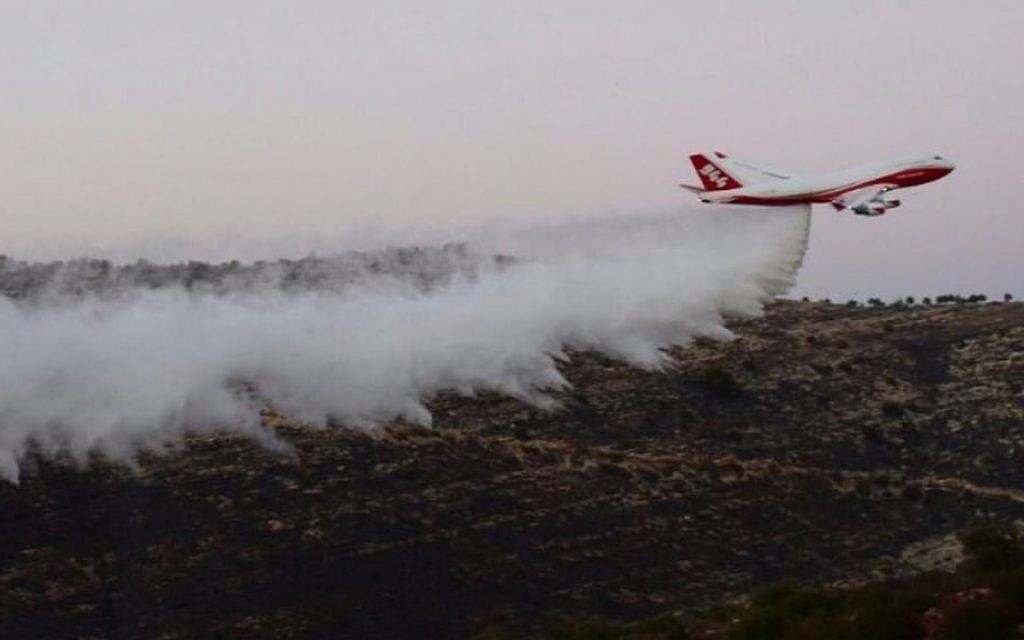 The 747 Supertanker helps to extinguish a forest fire which broke out near Nataf, outside Jerusalem on November 26, 2016. (Israel Police) The 747 Supertanker helps to extinguish a forest fire which broke out near Nataf, outside Jerusalem on November 26, 2016. (Israel Police)