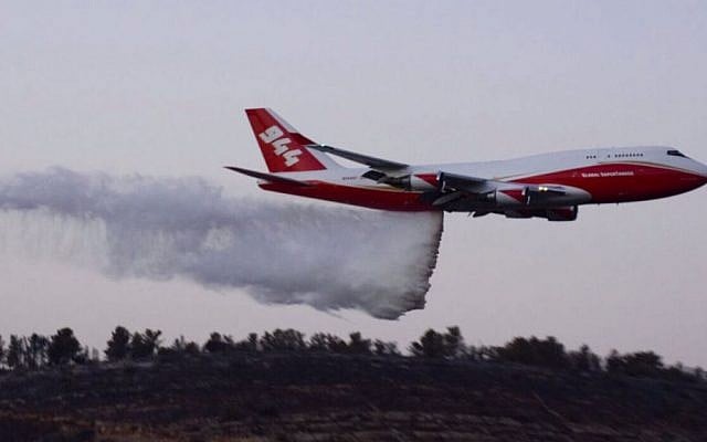 The 747 Supertanker helps to extinguish a forest fire which broke out near Nataf, outside Jerusalem on November 26, 2016. (Israel Police) The 747 Supertanker helps to extinguish a forest fire which broke out near Nataf, outside Jerusalem on November 26, 2016. (Israel Police)