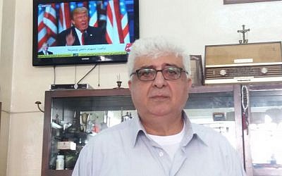 A Palestinian barber, Eskandi Hinn, 60, in Ramallah on November 9, 2016 (Dov Lieber/Times of Israel)