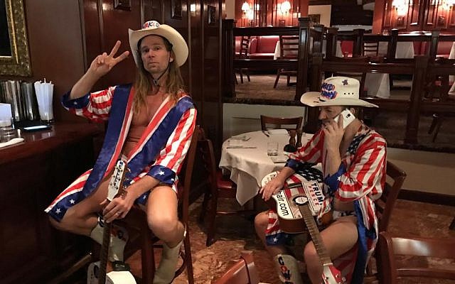 Robert Burck, also known as Naked Man (left), sits with Robert Coffman (right) in Trump Tower on Election Day, Nov. 8, 2016 (Eric Cortellessa/Times of Israel) Robert Burck, also known as Naked Man (left), sits with Robert Coffman (right) in Trump Tower on Election Day, Nov. 8, 2016 (Eric Cortellessa/Times of Israel)