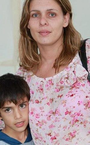 A photo uploaded to Facebook in 2012 by Galit Popok. In the image, she stands with her youngest son in Israel, formerly named Mahmoud and now Maor. (Credit: courtesy)