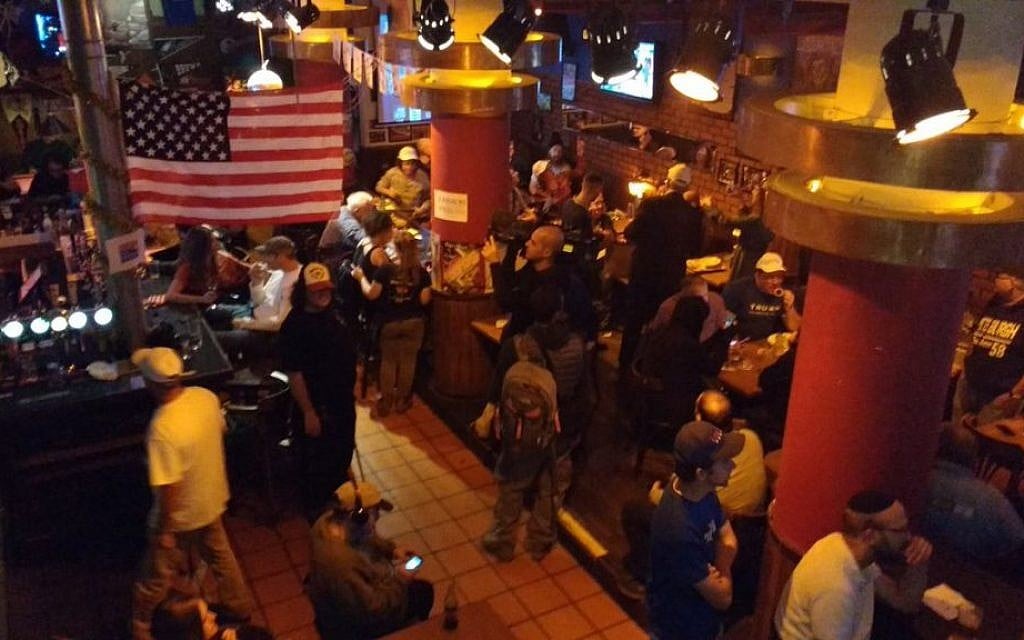 Election watchers crowding into Mike's Place bar in Jerusalem in the early hours of November 9, 2016. (Melanie Lidman/Times of Israel)
