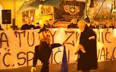 Protesters set fire to an effigy of an Orthodox Jew during an anti-migrant protest in the Polish town of  Wroclaw in November 2015 (screen capture: YouTube)
