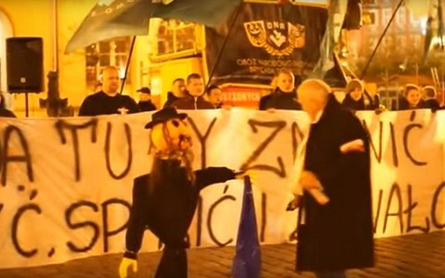Protesters set fire to an effigy of an Orthodox Jew during an anti-migrant protest in the Polish town of Wroclaw in November 2015 (screen capture: YouTube) Protesters set fire to an effigy of an Orthodox Jew during an anti-migrant protest in the Polish town of Wroclaw in November 2015 (screen capture: YouTube)