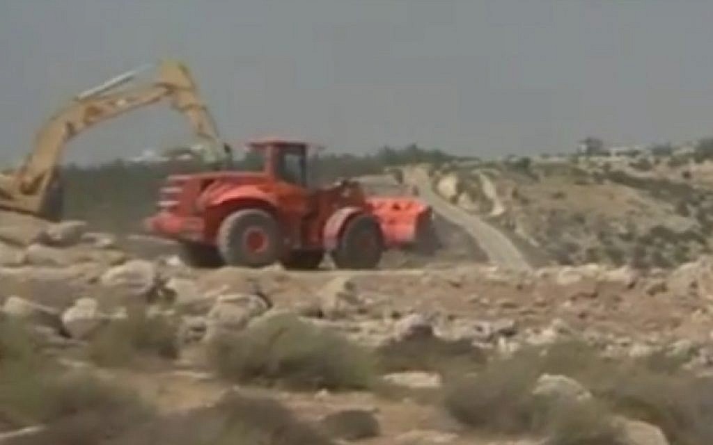 Israel begins construction of a segment of the security barrier in the West Bank (YouTube screenshot)