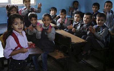 Abdel Ghani al-Attar, left, recites poetry to his classmates at a kindergarten in Rafah, Gaza, October 31, 2016. (AP Photo/Adel Hana) Abdel Ghani al-Attar, left, recites poetry to his classmates at a kindergarten in Rafah, Gaza, October 31, 2016. (AP Photo/Adel Hana)