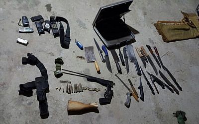 Knives and gun parts seized by Israeli soldiers during a raid in Yatta, outside Hebron, early in the morning on November 8, 2016. (IDF Spokesperson's Unit)