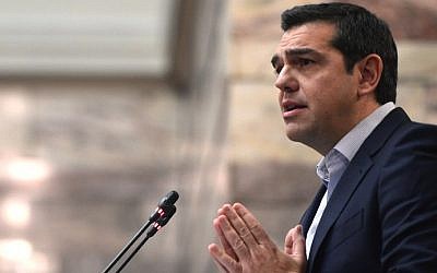 Greek Prime Minister Alexis Tsipras addresses his party's parliamentary group at the Greek parliament in Athens on November 23, 2016. (AFP PHOTO / LOUISA GOULIAMAKI)